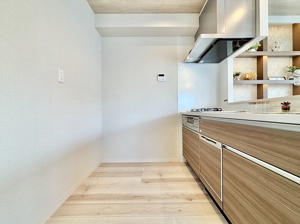 新宿サマリヤマンション_ペニンシュラタイプのキッチンの写真2