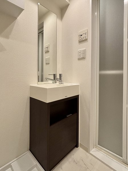豊栄新都心マンション_ホテルライクな洗面化粧台の写真