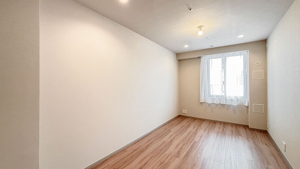 クロスエアタワー_メインのベットルームに最適な洋室の写真1