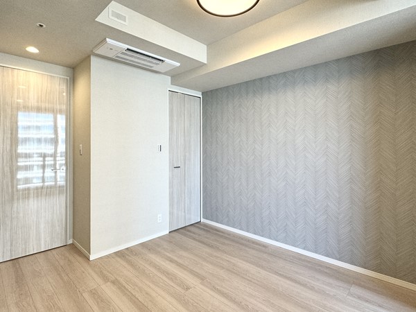 シティタワー麻布十番_アクセントクロスが取り入れられた洋室の写真