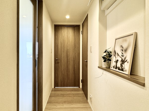 アミスタ北糀谷_ニッチがある廊下の写真