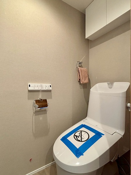 ペイサージュ音羽壱番館_ベージュを基調としたトイレの写真