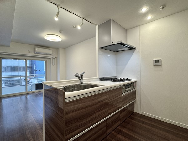 クレール三田_対面キッチンの写真