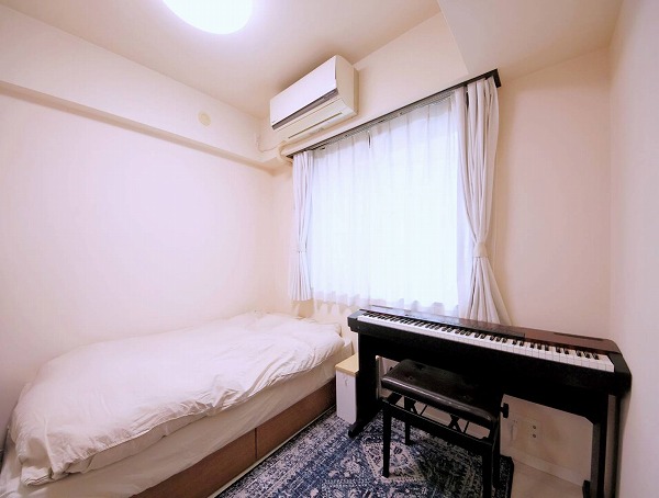 代々木ヒルズ_ホワイトを基調とした洋室の写真