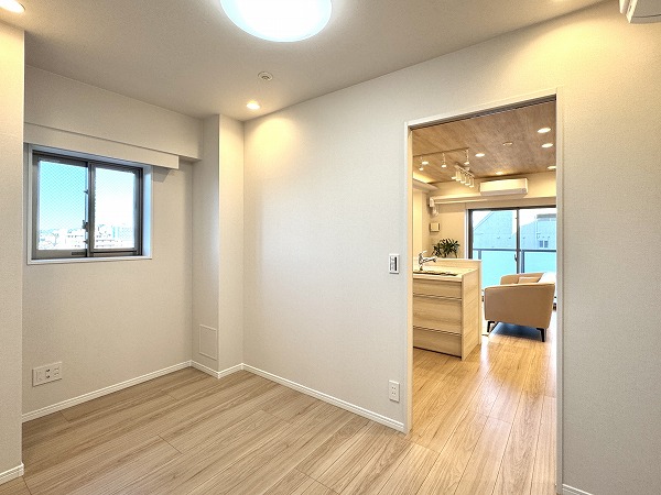 シーズクロノス蒲田_LDKと隣接した洋室の写真