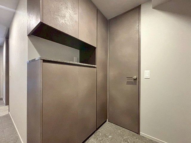 プラウド神田_清潔感のある玄関の写真