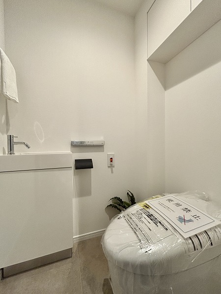 グランヴェール代々木西原_白を基調としたトイレの写真